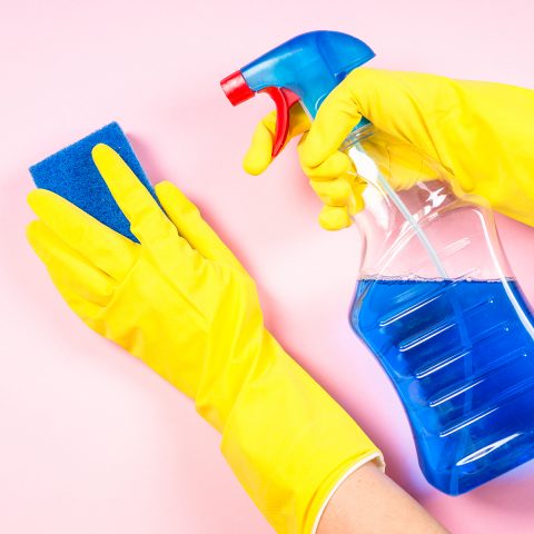 Cleaning concept with microfiber rag, gloves and cleaning spray agent.