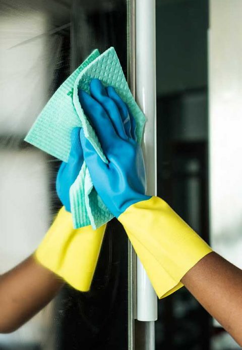 cleaning-mirror-close-up-vertical-web